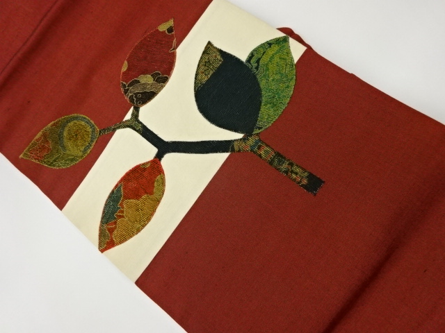 リサイクル　手織り紬パッチワーク横段に枝葉模様名古屋帯